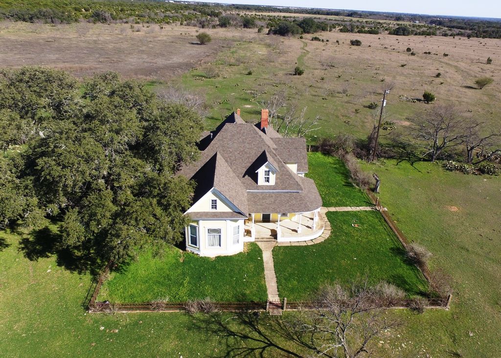 Historic Central Texas home with a replacement roof installed by A Classic Roofing