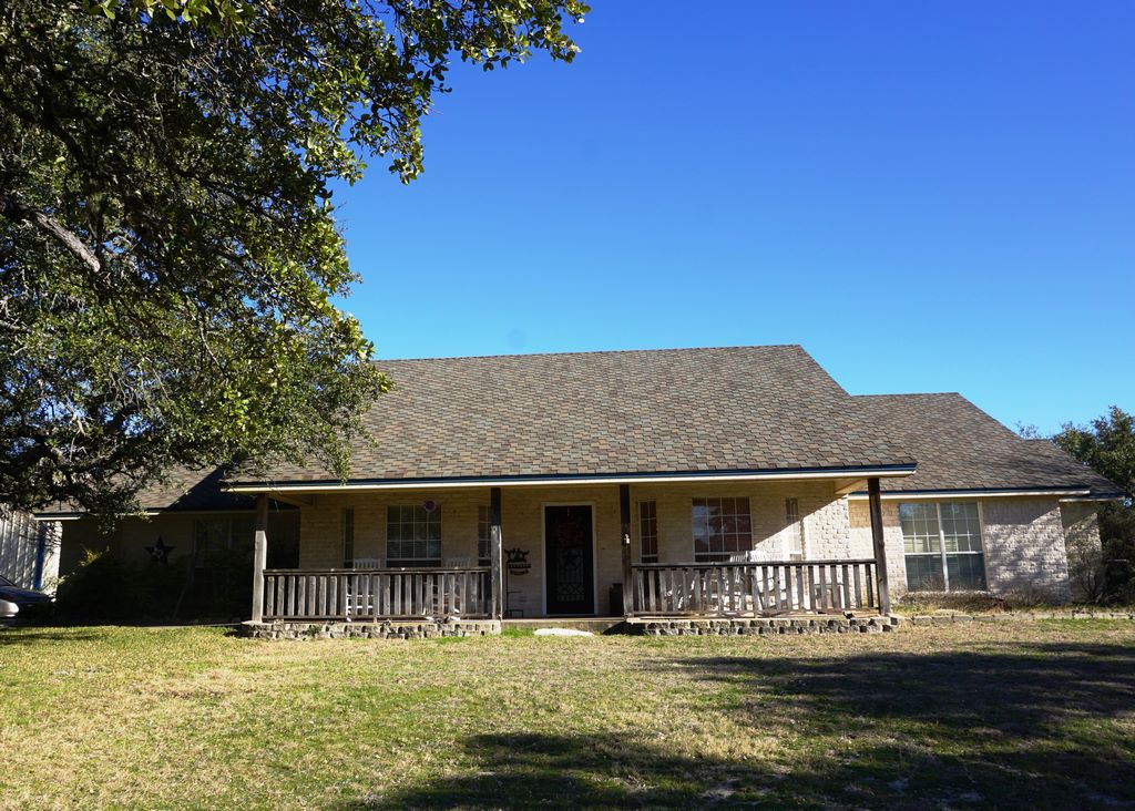 Residential shingle roof repaired by A Classic Roofing in Central Texas